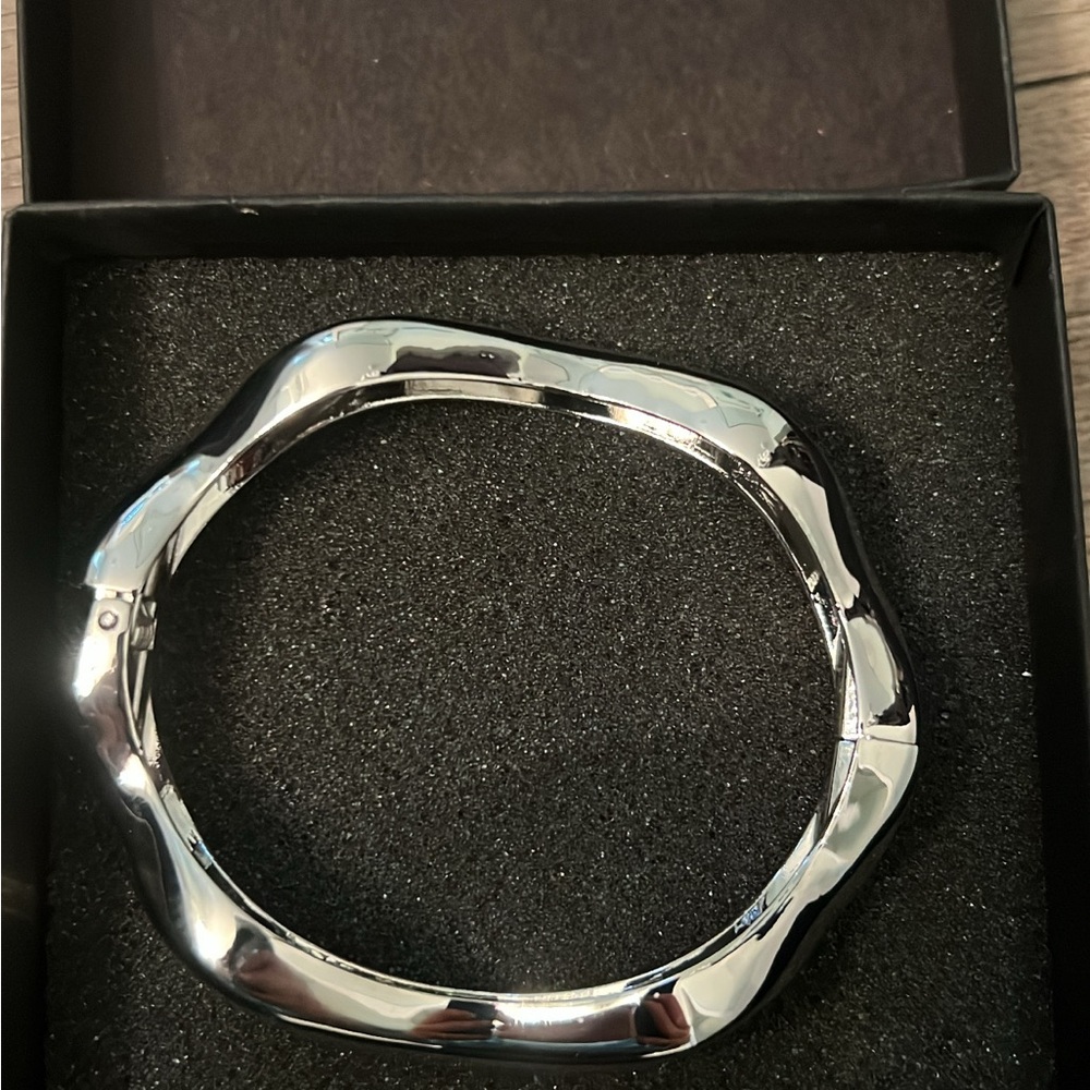 Silver-tone Sculpted Bangle Bracelet - Picture 1 of 2
